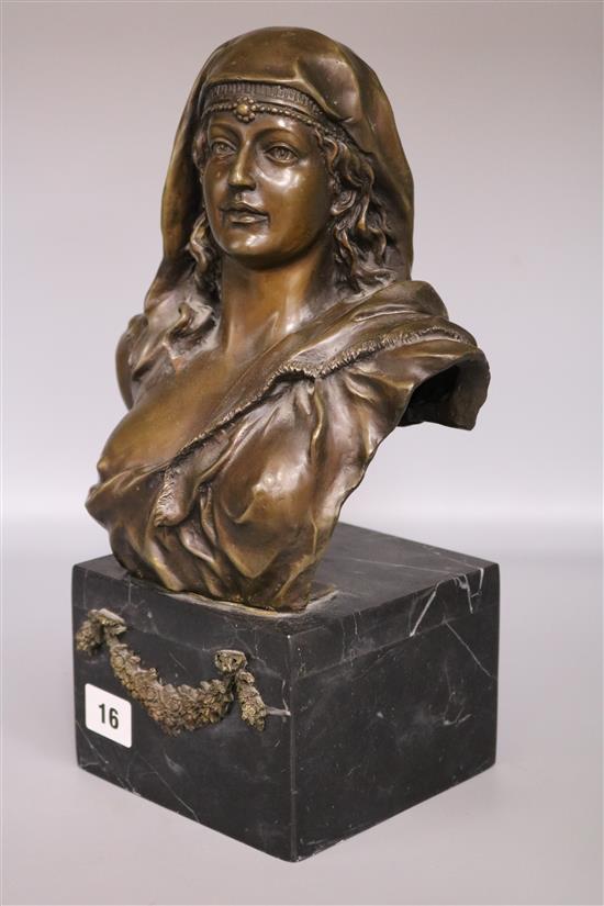 A bronze bust of an Eastern lady